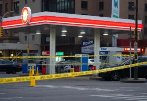 Police investigating a shooting scene at a gas station in Cleveland